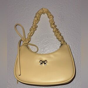 Elegant Yellow Handbag with Bow Detail